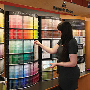 A customer selecting paint colors